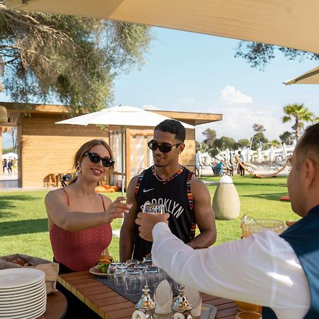 Radisson Blu Resort Αλ Χοσέιμα Εξωτερικό φωτογραφία The Beach Club at the Four Seasons Resort Palm Beach
