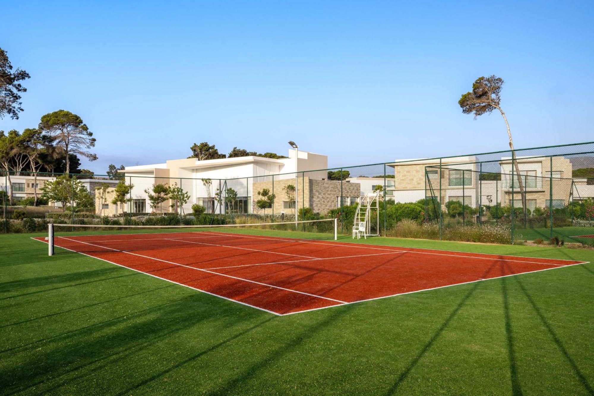 Radisson Blu Resort Αλ Χοσέιμα Εξωτερικό φωτογραφία Tennis court